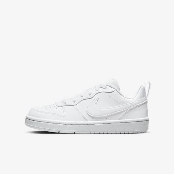 Kids witte sneakers en schoenen. Nike BE